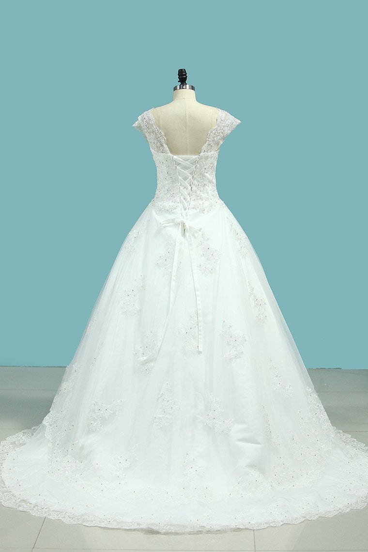 A Line V Neck Wedding Dresses Tulle With Applique And Beads Lace Up