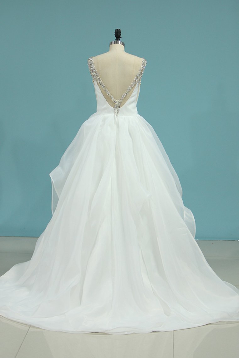 2024 New Arrival Straps Open Back Wedding Dresses A Line Organza With Beads