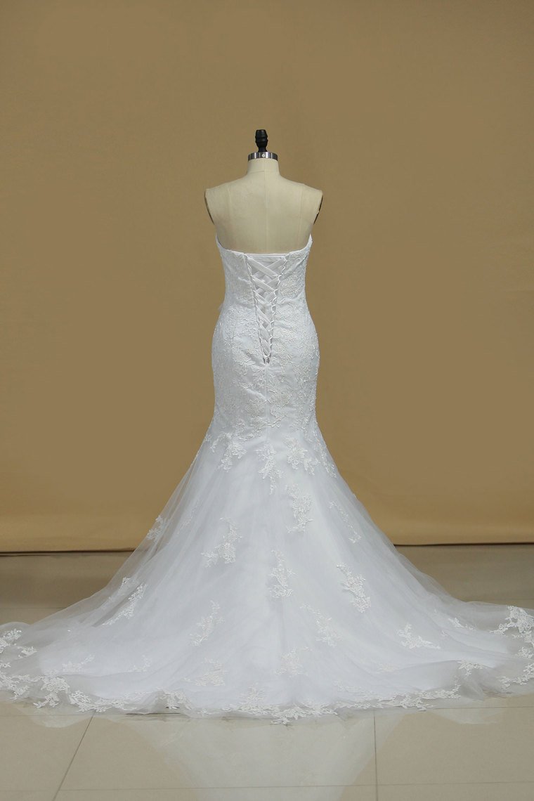 Strapless Mermaid/Trumpet Wedding Dress With Applique Organza Chapel Train