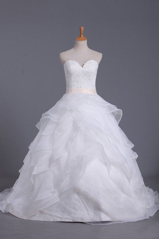 2024 New Arrival Wedding Dresses Sweetheart A Line Organza With Beading & Sash