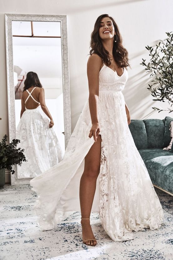 Charming Lace Long A-line Spaghetti Straps Ivory V-Neck Beach Wedding Dress