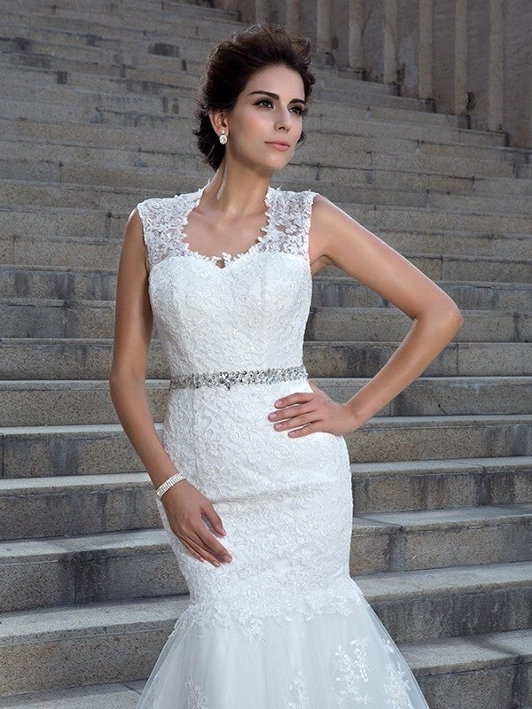 Sleeveless Long V-neck Applique Trumpet/Mermaid Lace Wedding Dresses